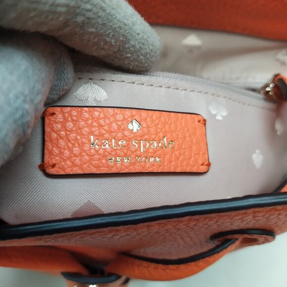 Kate Spade New York Orange Pebbled Leather Zipper Drawstring Top Handle Backpack main image 7